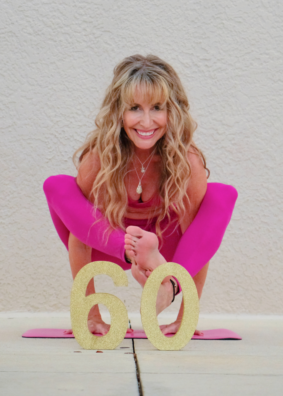 Turning-60-yoga-arm-balance - Lorraine C. Ladish